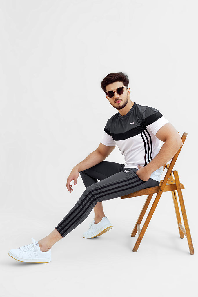 sitting pose summer grey tri liner track suit.