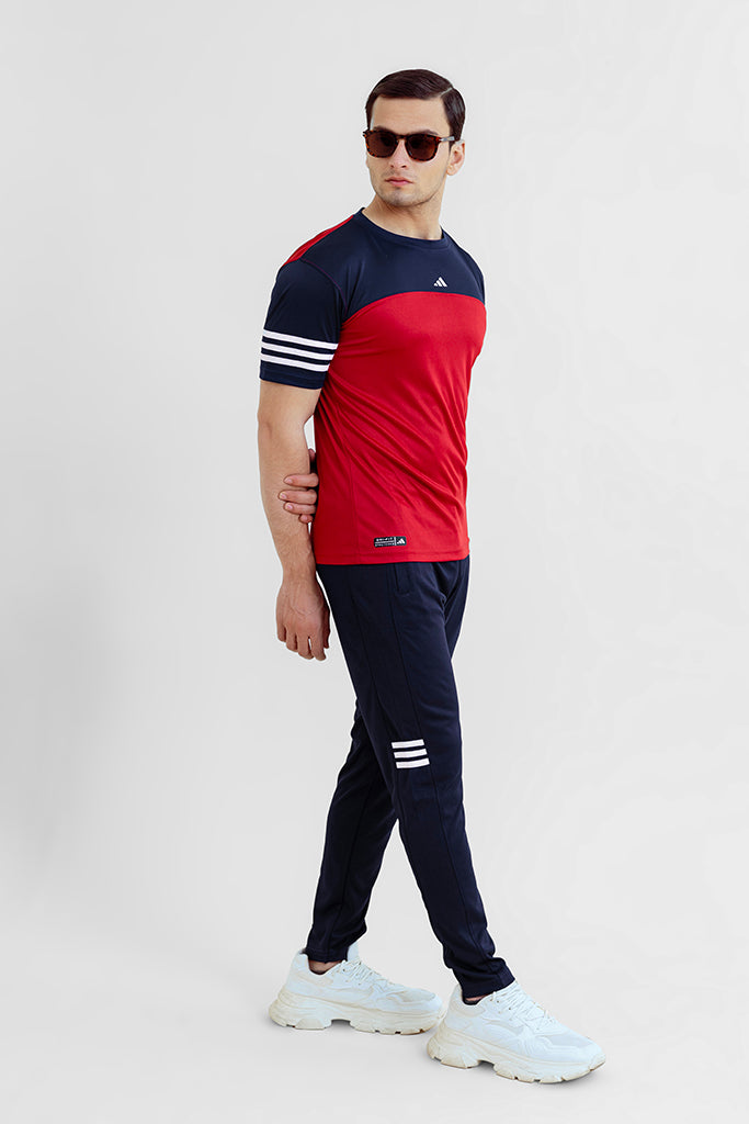 Red and Blue Adi Premium Tracksuit Pose.